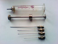 Syringe with needle and needle cap.jpeg